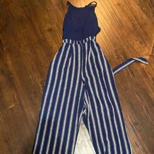 blue , white and gold romper .